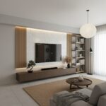 A sleek, minimalist living room featuring a textured white tile wall with wooden accents, a mounted flat-screen TV, and conte.