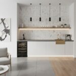 White marble tile with gray veining, smooth texture, used as a kitchen backsplash and countertop accent.