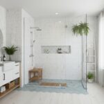 Bright white marble tiles with subtle gray veining, textured surface, and sleek finish.