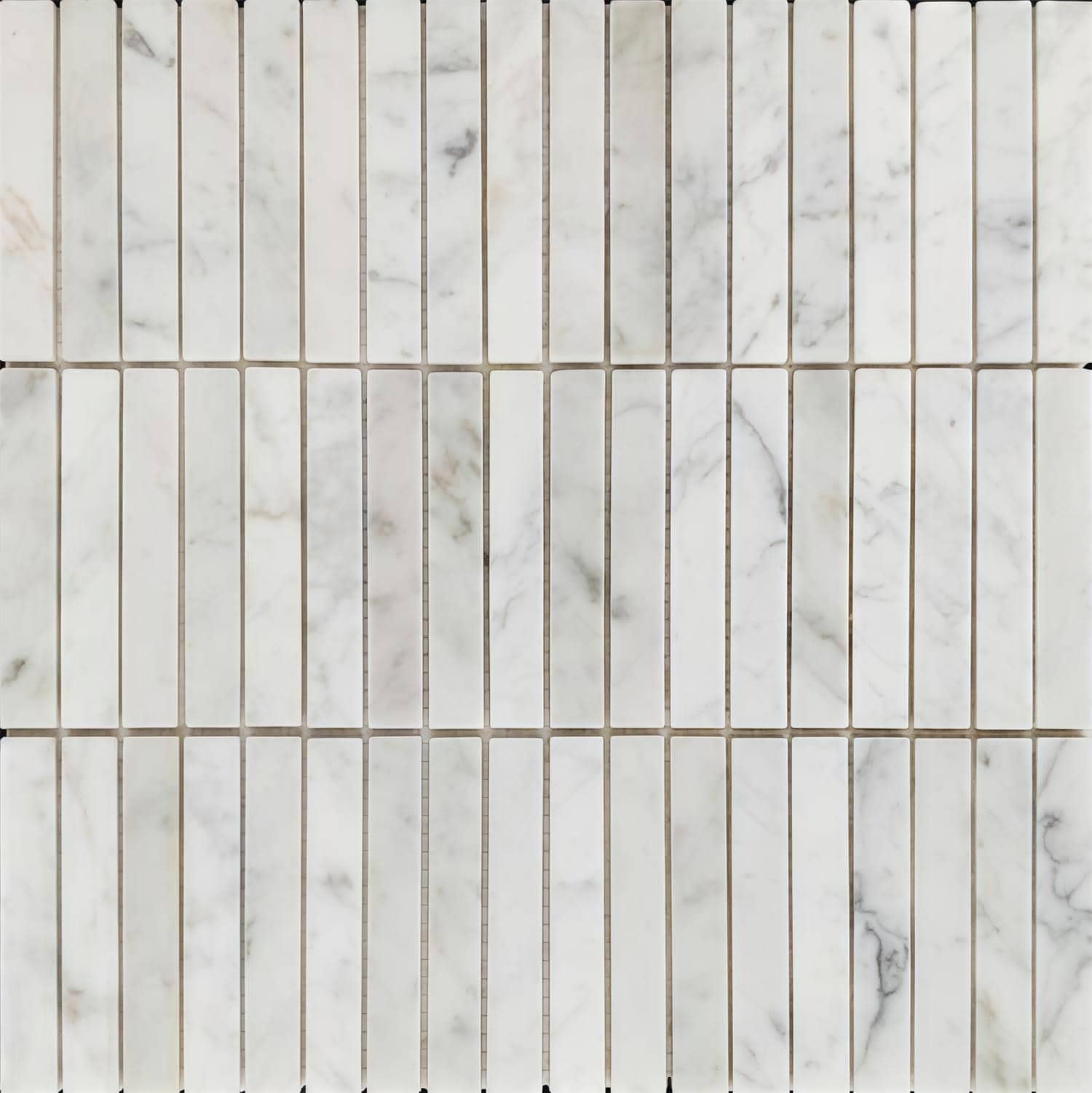 Marble tile featuring a white and gray color palette with a smooth, polished texture and subtle veining. Thin grout lines cre.