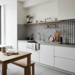 White and black geometric patterned ceramic tiles for kitchen backsplash, with a smooth matte finish and modern design.