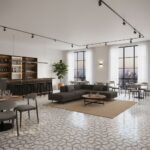 Bright living room featuring light gray geometric patterned tiles, large windows, and contemporary furniture.