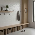 Mother of pearl shell tile wall decor with hooks and storage baskets in a modern entryway.