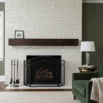 Elegant fireplace with mother of pearl shell tile accent wall.