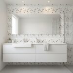 Mother of pearl shell tile in a modern bathroom with white vanity and large mirror.