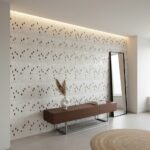 A stylish interior featuring a wall decorated with mother of pearl shell tiles, complemented by a modern wooden console and a.