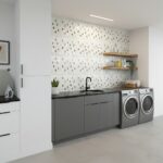Shell tile with mother of pearl accents in modern laundry room setting.