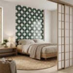 Decorative green and white patterned ceramic tiles in a bedroom.