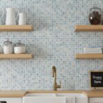 Blue mosaic tile backsplash with textured surface and glossy finish in a kitchen setting.