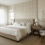 Light beige textured tile wall behind a bed, adding subtle pattern and warmth to the bedroom decor.