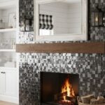 Black and white mosaic tile with glossy finish, textured surface, in a contemporary living room.