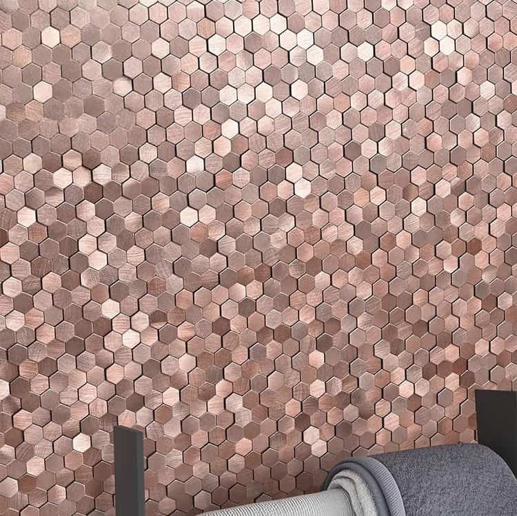 Pink and beige hexagon tiles with matte finish, textured surface, arranged in a honeycomb pattern.