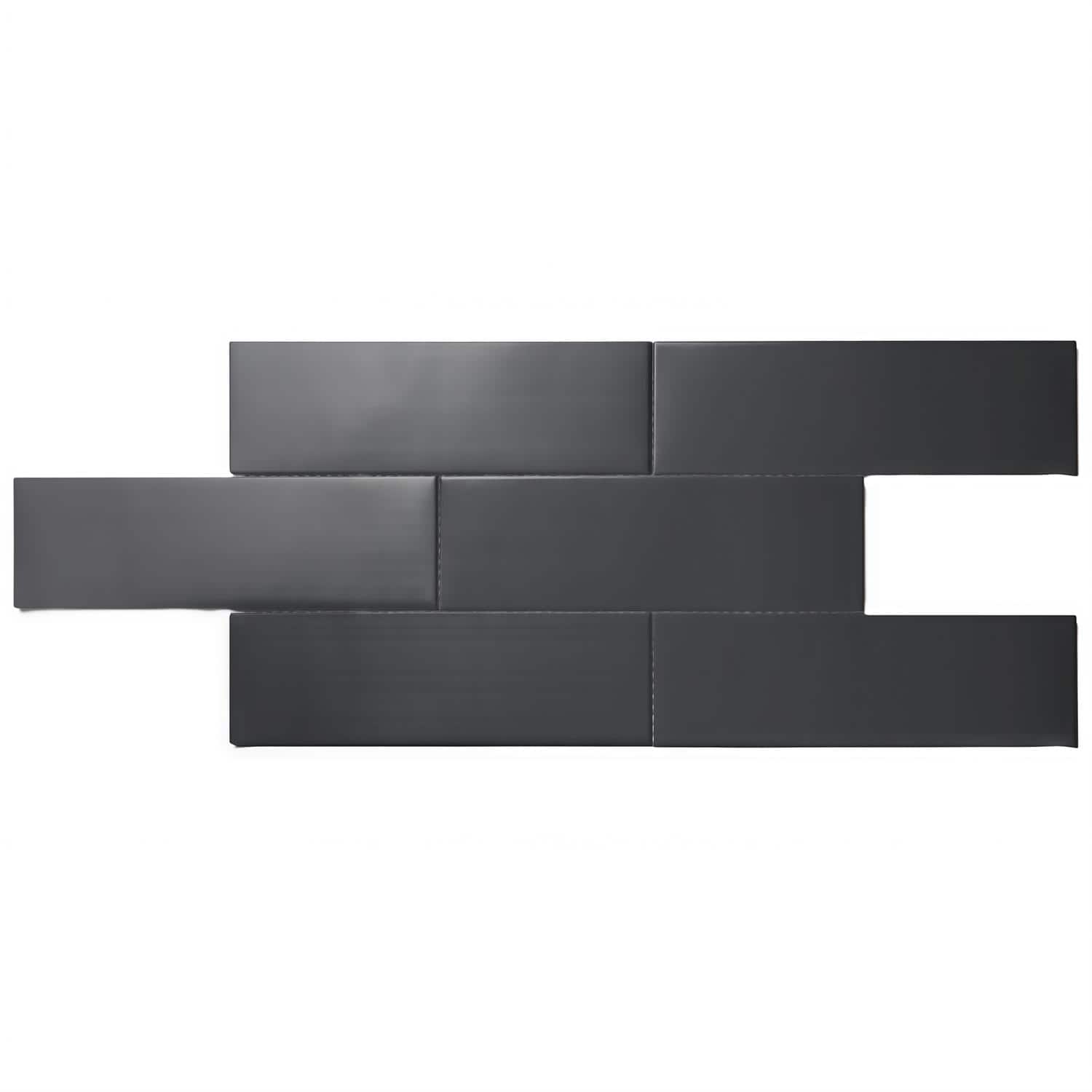 Dark gray matte ceramic tiles with smooth texture, arranged in a staggered pattern for contemporary wall design.