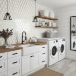 Bright laundry room featuring white hexagon tiles, wooden accents, and modern appliances.