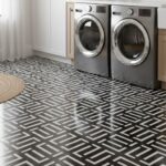Black and white geometric patterned tile with matte finish, textured surface, in a laundry room setting.