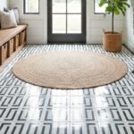 Black and white patterned ceramic tiles with glossy finish and textured surface.