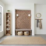 Decorative hexagon mosaic tile in earthy tones with textured surface.