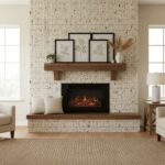 Bright mosaic tile fireplace wall with beige and brown tones, featuring a wooden mantel and decorative framed botanical print.