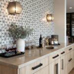 Geometric ceramic tile in white and gray tones with textured surface.