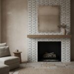 Beige textured tiles with a black fireplace and geometric patterned tiles in black and white.