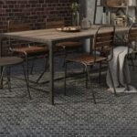 Gray textured concrete tile with a matte finish, suitable for indoor and outdoor dining spaces.
