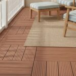 Light brown wood tile with textured, grooved surface and natural wood grain appearance.