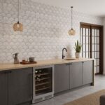 Light beige textured ceramic tiles with a subtle scallop pattern on the wall. Perfect for modern kitchen or living room decor.