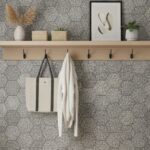 Gray hexagon tile wall with textured surface and matte finish, perfect for modern interior decor.