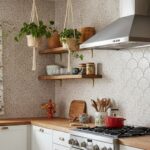 Cream and beige ceramic tile backsplash with textured pattern, smooth surface, and subtle design.