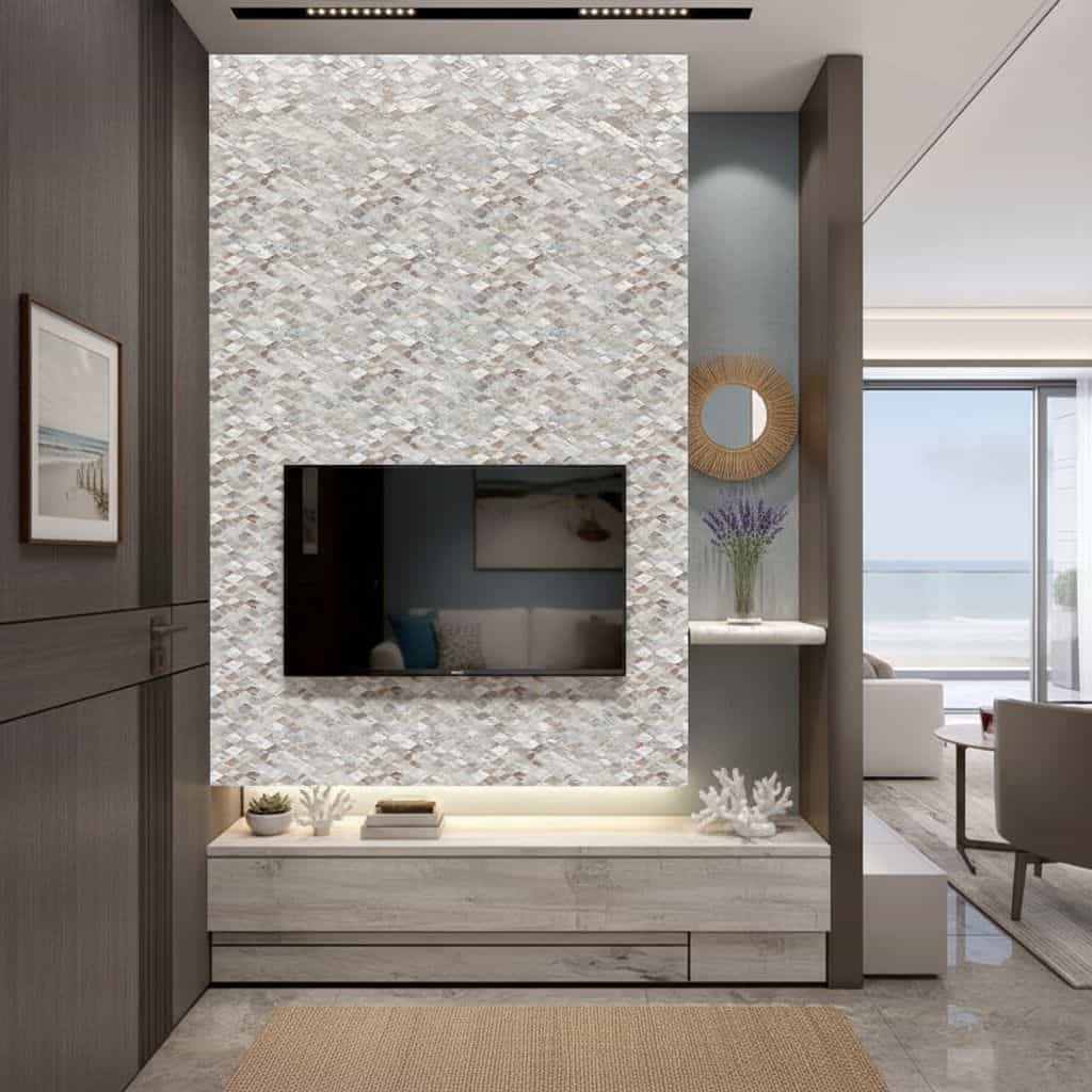 Textured white and gray stone tile wall behind flat-screen TV.