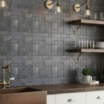 Gray slate tile wall with textured, matte finish and natural stone appearance.