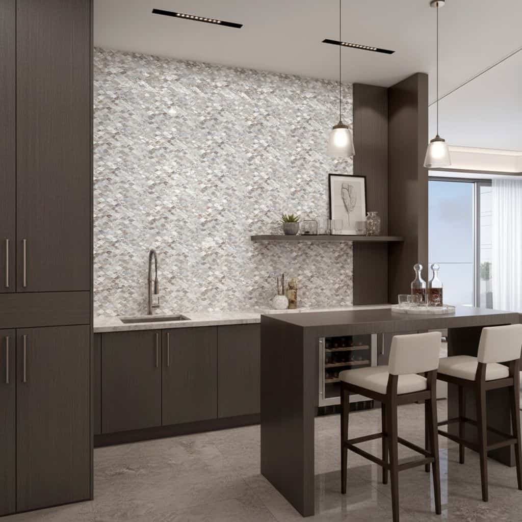 Modern gray stone tile backsplash with textured surface in a contemporary kitchen setting.