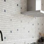 White and blue mosaic ceramic tiles with smooth texture and glossy finish.