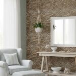 Light gray and white striped upholstered armchair with soft cushions, in a bright, airy space with natural light.