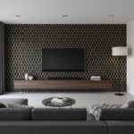 Black tile with gold geometric pattern, smooth texture, contemporary style.