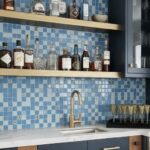 Blue mosaic tile with textured surface and glossy finish.
