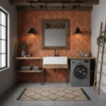 Rustic terracotta tile wall with textured geometric pattern behind farmhouse sink and laundry appliances.