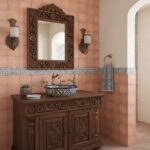 Decorative ceramic sink with intricate blue and white patterns.