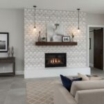 White scallop patterned ceramic tile with a glossy finish, used as a feature wall behind the fireplace.