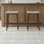 Wooden tile with a light beige color and smooth texture.