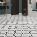 Black and white ceramic tile with geometric pattern, smooth texture, and glossy finish.