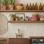 Beige ceramic tile with smooth texture and subtle pattern, complementing the warm wooden cabinets and decor.