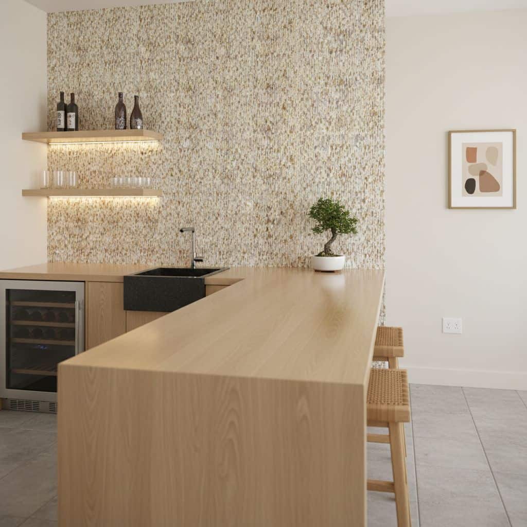 Beige mosaic tile wall with textured surface in a contemporary kitchen setting.