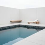 azure black glass tile luxury pool design