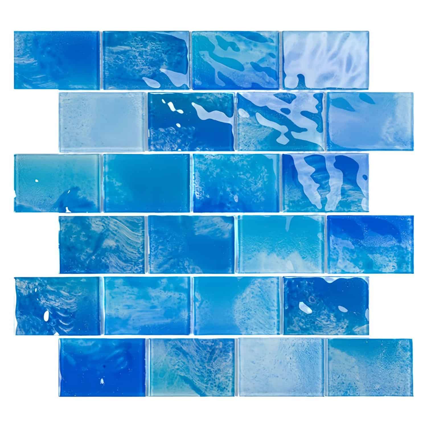 Blue glass mosaic tile with glossy finish and irregular pattern, featuring various shades of blue and textured surface.