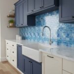 Blue mosaic tile backsplash with glossy finish and textured surface.
