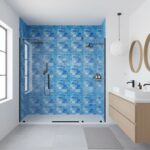 Blue mosaic tile, textured surface, in a modern bathroom shower.