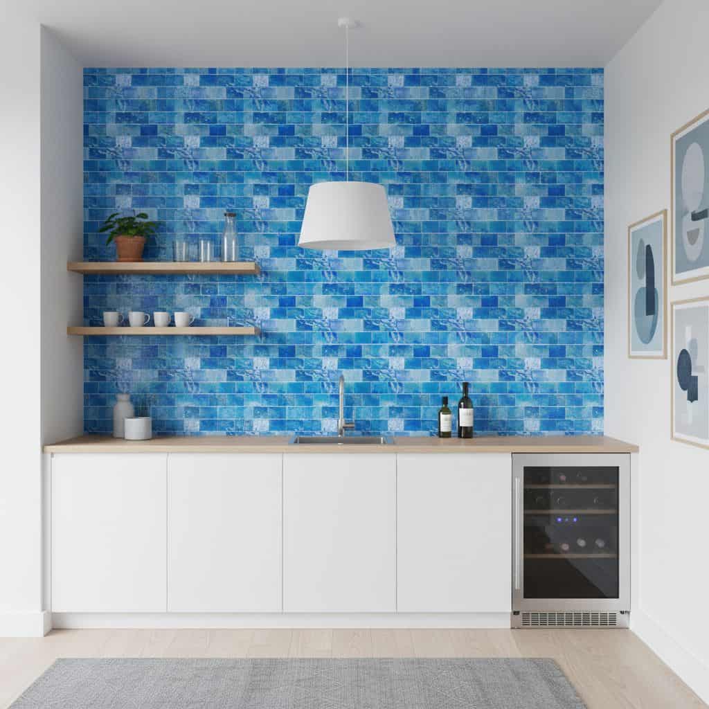 Blue mosaic tile backsplash with textured surface and glossy finish.
