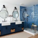 Blue mosaic tile shower with glass door and wooden stool.