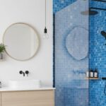 Bright blue mosaic tile with textured surface and glossy finish.